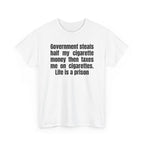 White t-shirt printed with "Government steals half my cigarette money then taxes me on cigarettes. Life is a prison", shown flat from another angle.