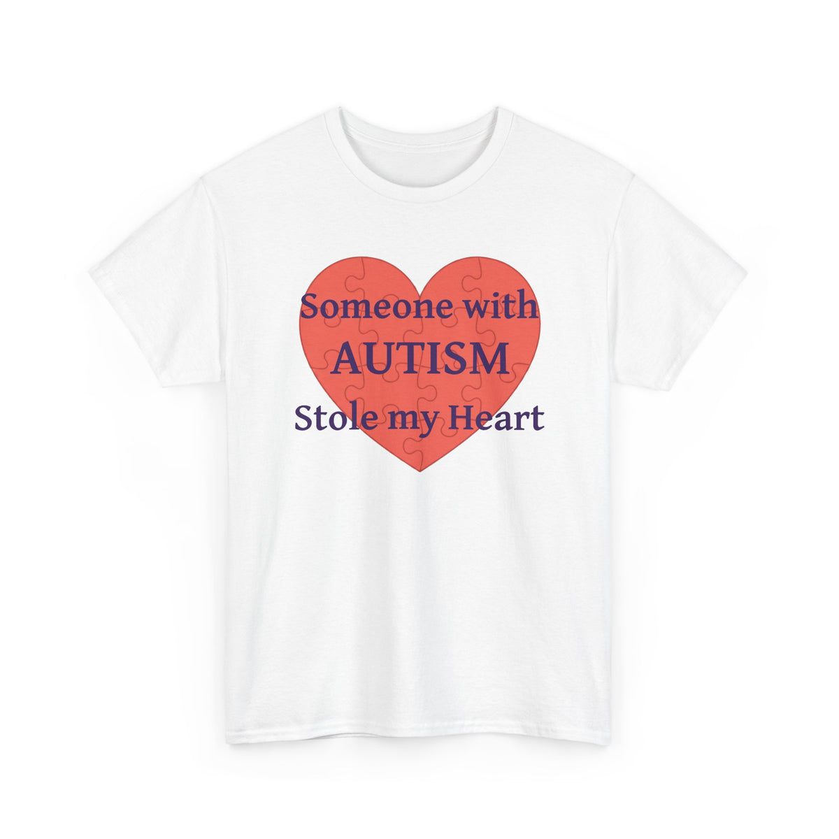 White t-shirt printed with a large salmon-red heart made of jigsaw puzzle pieces, lettered across it "Someone with AUTISM Stole my Heart", shown flat from another angle.