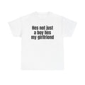 White t-shirt printed with "Hes not just a boy hes my girlfriend".