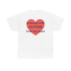 White t-shirt, back printed printed with a large salmon-red heart made of jigsaw puzzle pieces, lettered across it "Someone with AUTISM Stole my Heart".