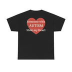Black t-shirt, back printed printed with a large salmon-red heart made of jigsaw puzzle pieces, lettered across it "Someone with AUTISM Stole my Heart".