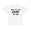 White t-shirt printed with "It was revealed to me by the microplastics in my brain".