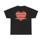 Black t-shirt, back printed printed with a large salmon-red heart made of jigsaw puzzle pieces, lettered across it "Someone with AUTISM Stole my Heart".
