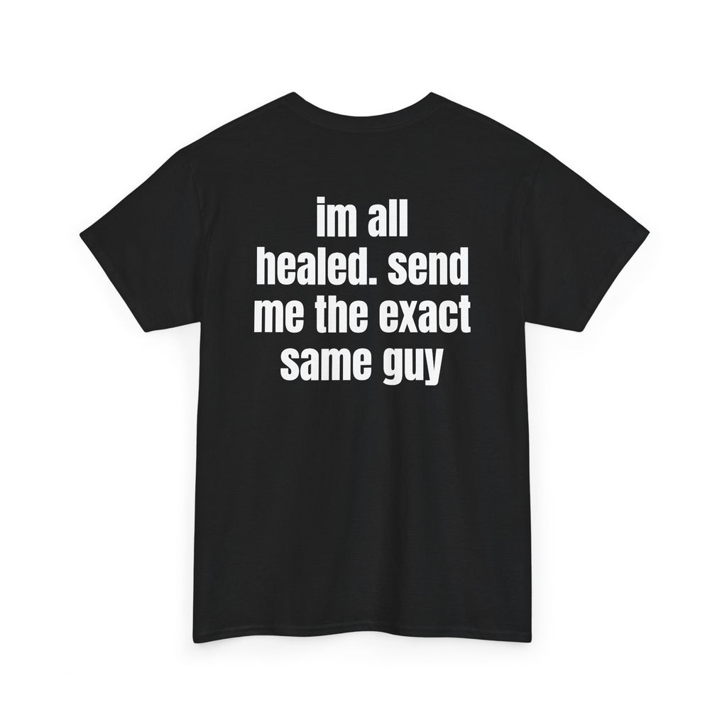 Black t-shirt, back printed with "im all healed. send me the exact same guy", shown from another angle.
