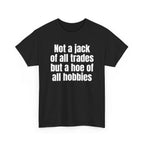 Black t-shirt printed with "Not a jack of all trades but a hoe of all hobbies", shown flat from another angle.
