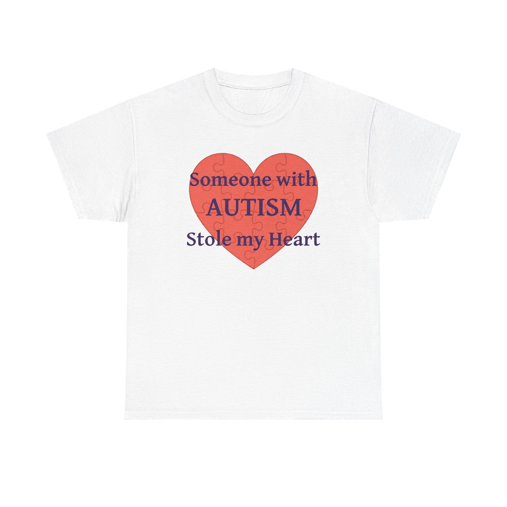 White t-shirt printed with a large salmon-red heart made of jigsaw puzzle pieces, lettered across it "Someone with AUTISM Stole my Heart".