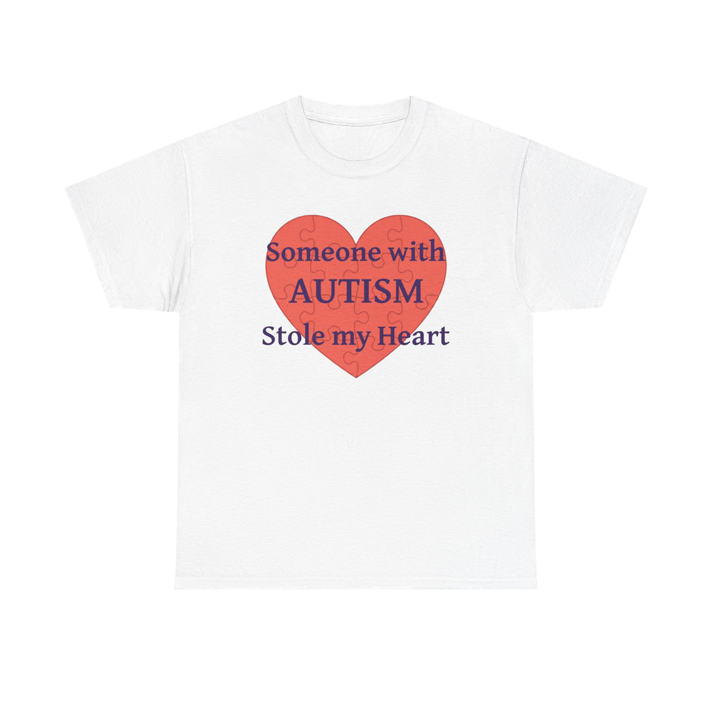 White t-shirt printed with a large salmon-red heart made of jigsaw puzzle pieces, lettered across it "Someone with AUTISM Stole my Heart".