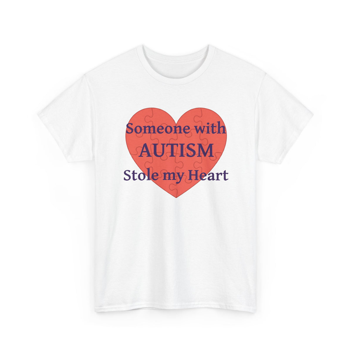 White t-shirt printed with a large salmon-red heart made of jigsaw puzzle pieces, lettered across it "Someone with AUTISM Stole my Heart", shown flat from another angle.