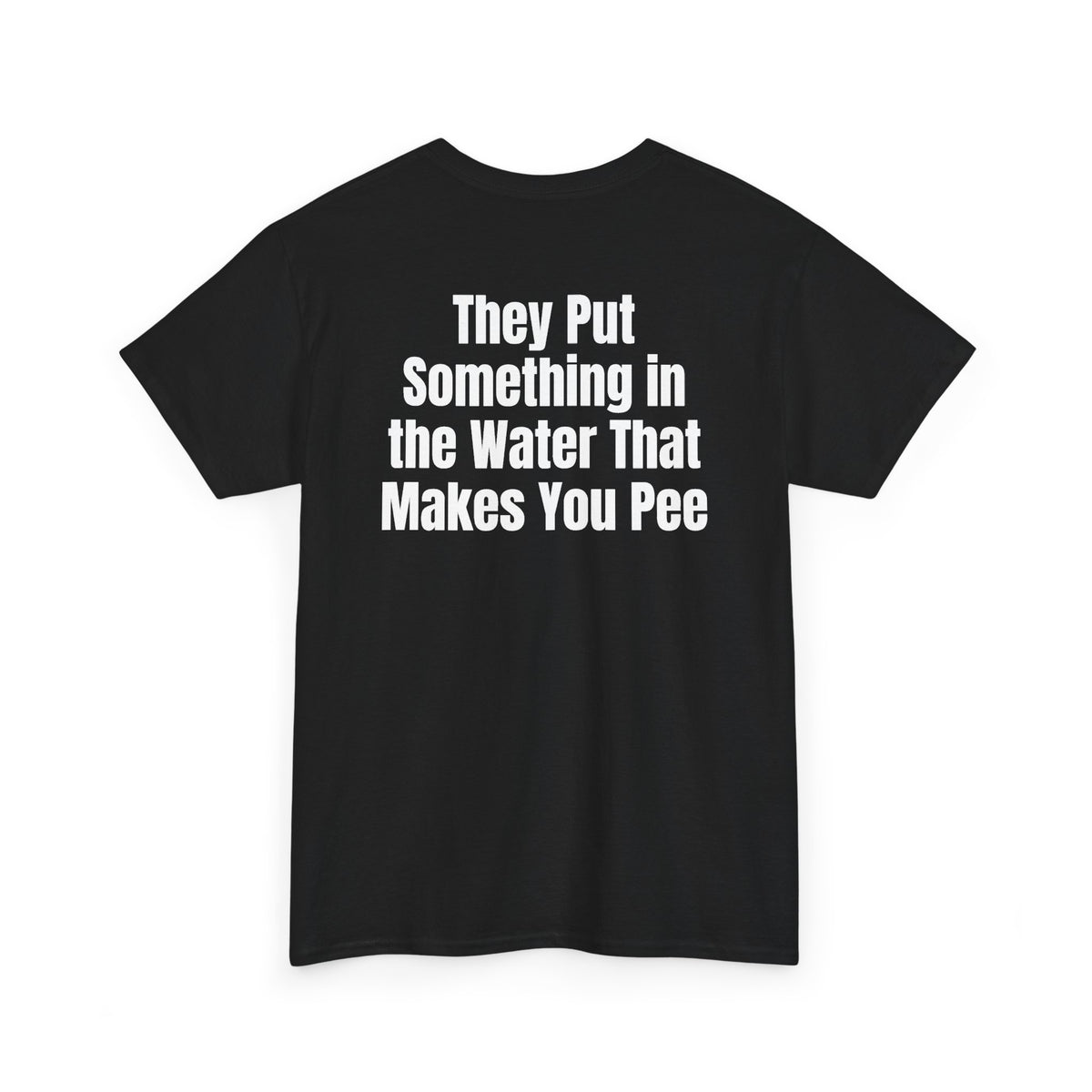 Black t-shirt, back printed with "They put something in the water that makes you pee", shown from another angle.