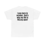 White t-shirt, back printed with "I was born in october. that's why my life is FALLing apart".