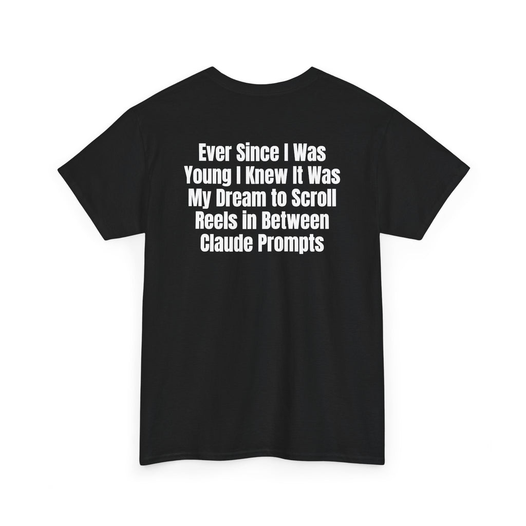 Black t-shirt, back printed with "Ever since i was young i knew it was my dream to scroll reels in between Claude prompts", shown from another angle.