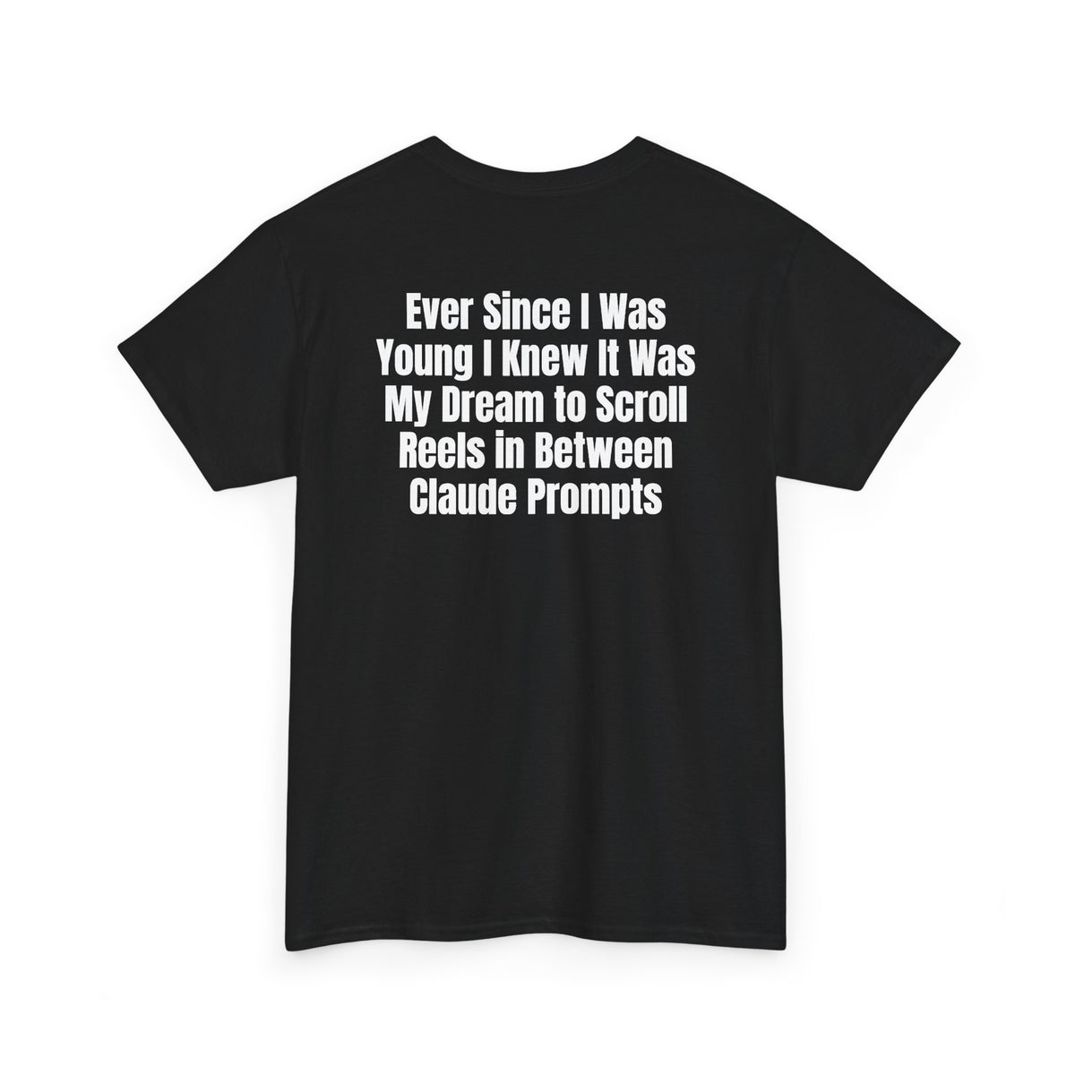 Black t-shirt, back printed with "Ever since i was young i knew it was my dream to scroll reels in between Claude prompts", shown from another angle.