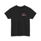 Black t-shirt printed with "I", a large red heart, then the word MICROPLASTICS, shown flat from another angle.