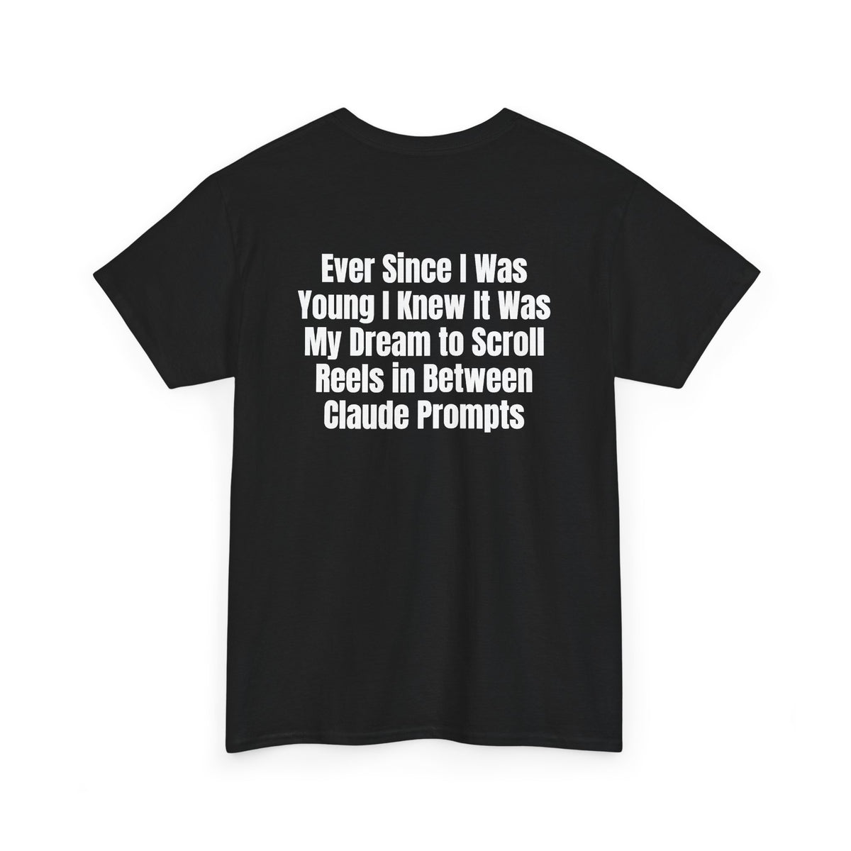 Black t-shirt, back printed with "Ever since i was young i knew it was my dream to scroll reels in between Claude prompts", shown from another angle.