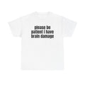 White t-shirt printed with "Please be patient i have brain damage".