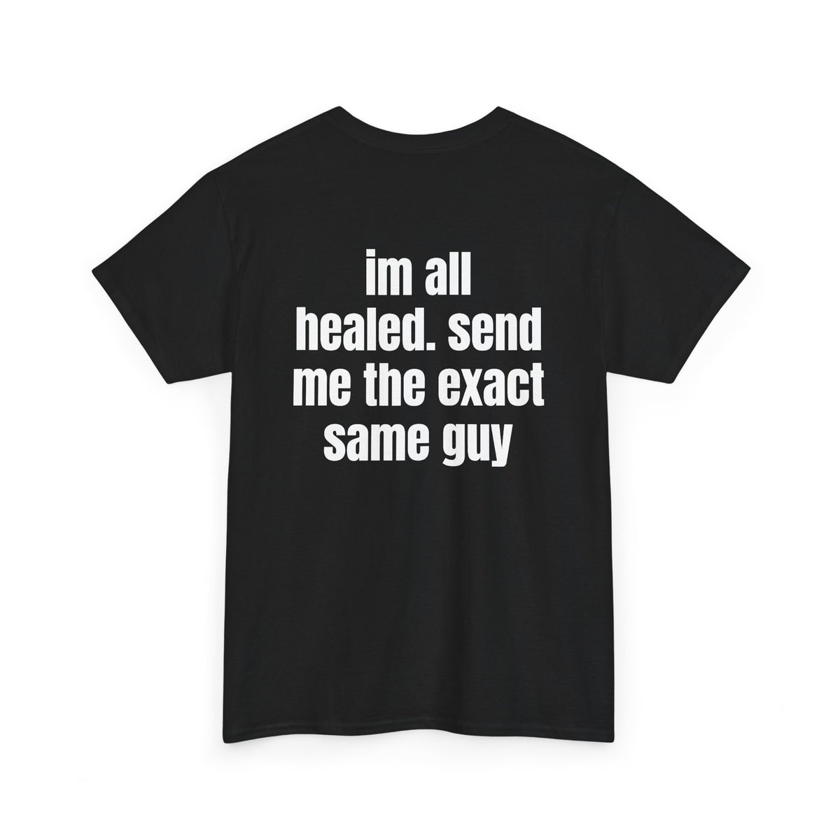 Black t-shirt, back printed with "im all healed. send me the exact same guy", shown from another angle.