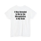 White t-shirt, back printed with "It was revealed to me by the microplastics in my brain", shown from another angle.