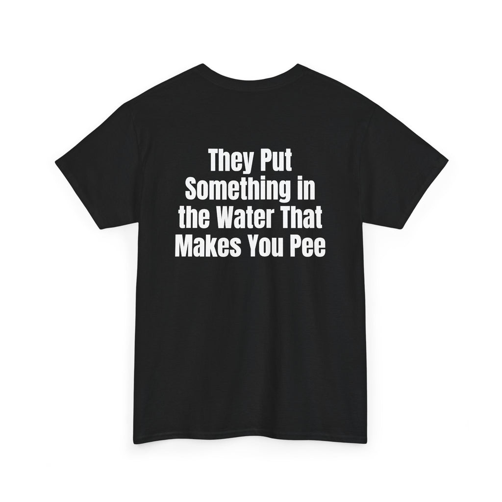 Black t-shirt, back printed with "They put something in the water that makes you pee", shown from another angle.