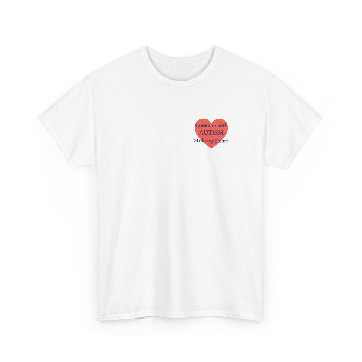 White t-shirt printed with a large salmon-red heart made of jigsaw puzzle pieces, lettered across it "Someone with AUTISM Stole my Heart", shown flat from another angle.