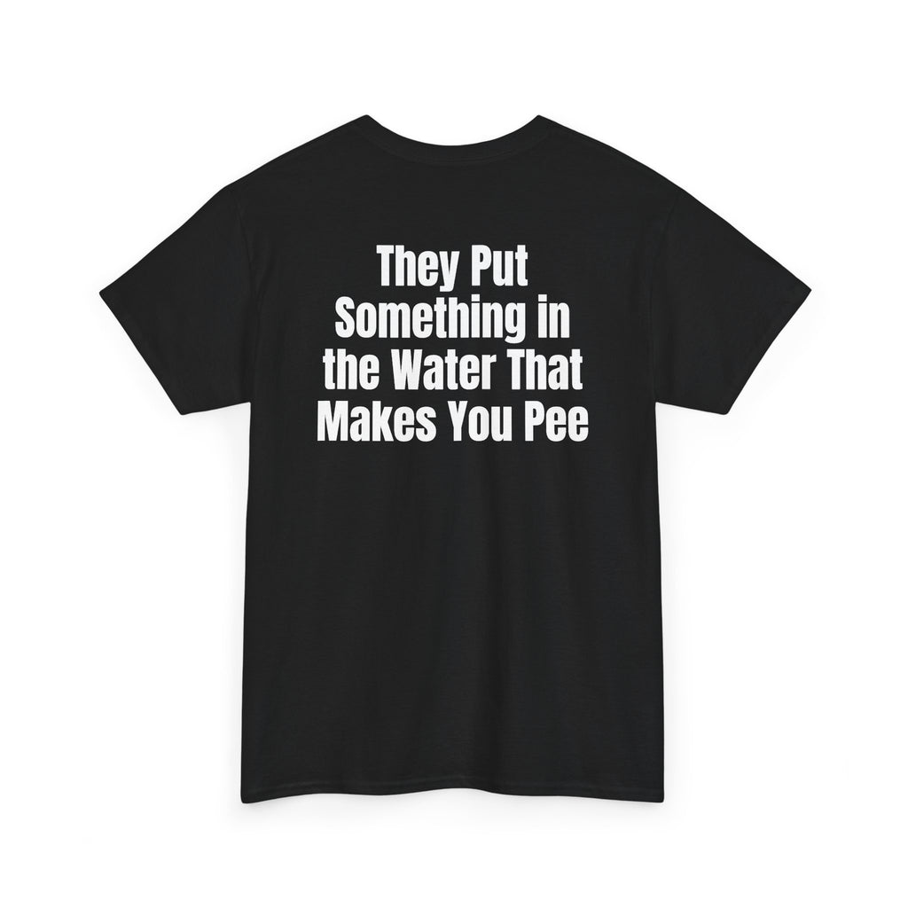 Black t-shirt, back printed with "They put something in the water that makes you pee", shown from another angle.