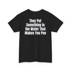 Black t-shirt, back printed with "They put something in the water that makes you pee", shown from another angle.
