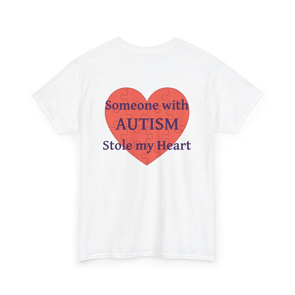 White t-shirt, back printed printed with a large salmon-red heart made of jigsaw puzzle pieces, lettered across it "Someone with AUTISM Stole my Heart", shown from another angle.