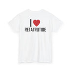 White t-shirt, back printed printed with "I", a large red heart, then the word RETATRUTIDE, shown from another angle.