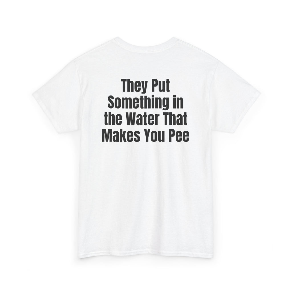 White t-shirt, back printed with "They put something in the water that makes you pee", shown from another angle.